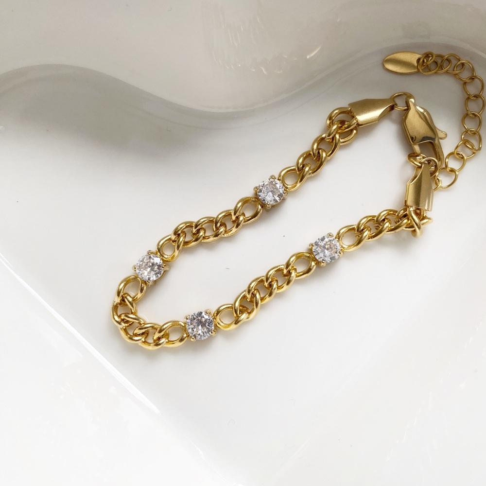 Diamond station cuban bracelet. 18k plated, cz